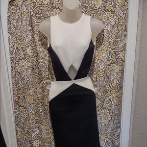 Black and white peekaboo dress with a halter back!